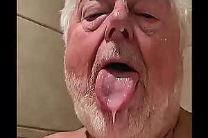 Faggot grandpa shows his cum splattered face