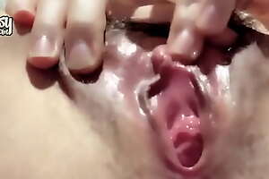 Closeup clit rubbing be proper of drenched Asian teen