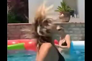 Bebe Rexha dancing and twerking nearby the pool