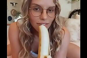 Sexy girl sucking banana