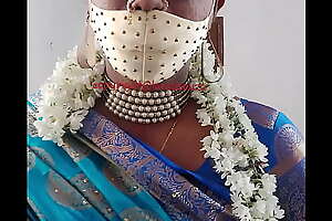 Indian beautiful crossdresser model in off colour saree