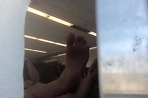 candidly girl's dirty paws and soles at airport