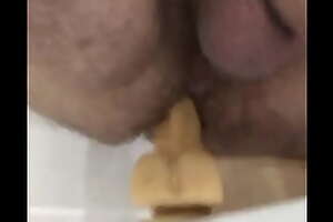 Suction cup dildo in queasy mans ass