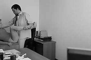 The boss fucks his employer to hand the office table and films euphoria on hidden cam